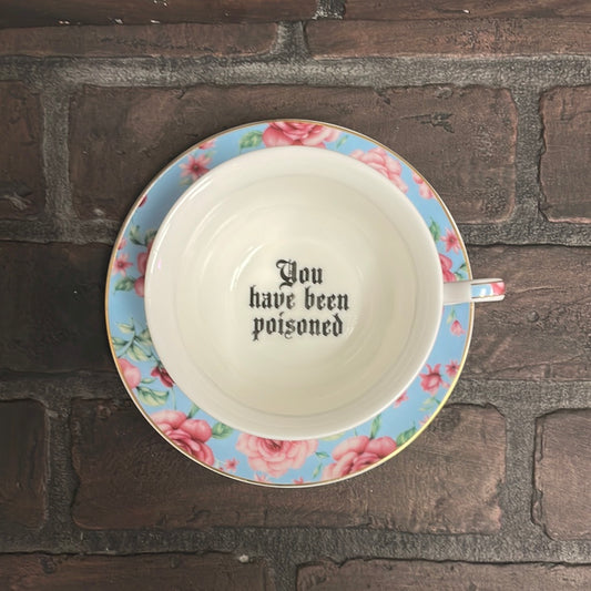 You’ve Been Poisoned, Blue Floral Tea cup and saucer