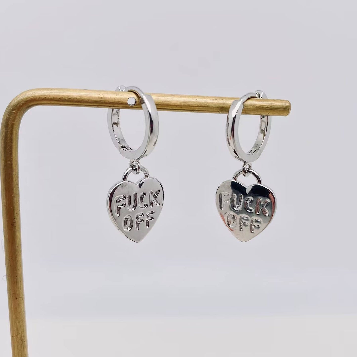 "Fuck off" Heart-shaped Gold Plated Huggie Earrings: Golden Mio Queena
