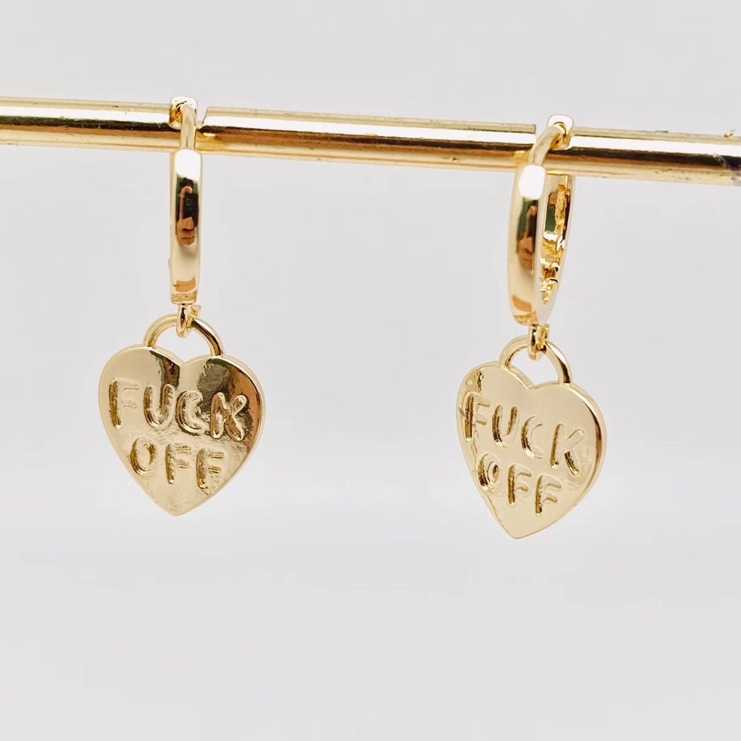 "Fuck off" Heart-shaped Gold Plated Huggie Earrings: Silver Mio Queena