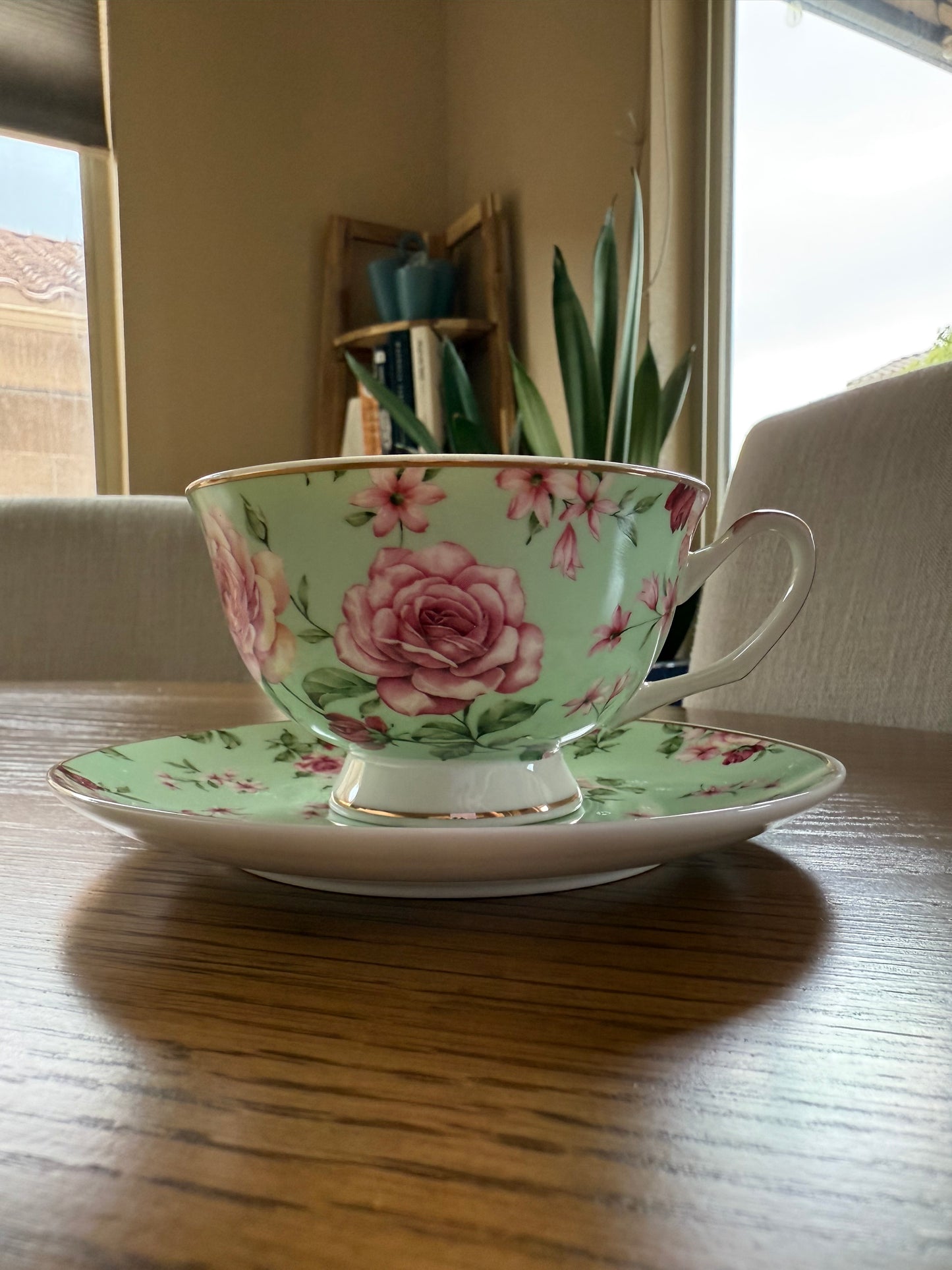 You've been Poisoned Tea Cup & Bye Saucer, Sea Foam Green and pink Rose Floral Pattern