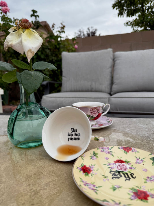 You’ve been poisoned, Tea cup and saucer, Yellow and Red Floral