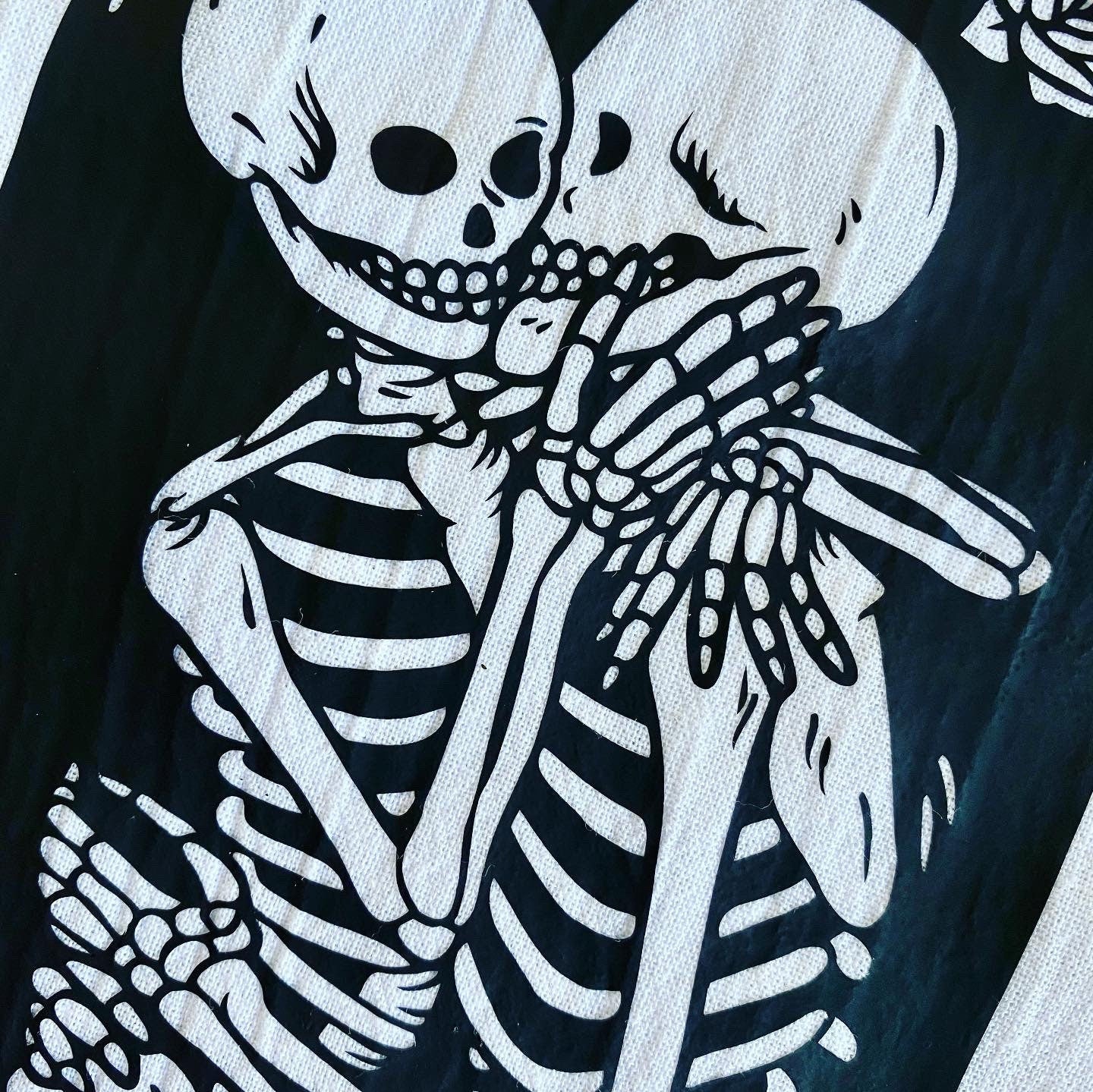 Forever Yours, embracing skeletons Tea towel