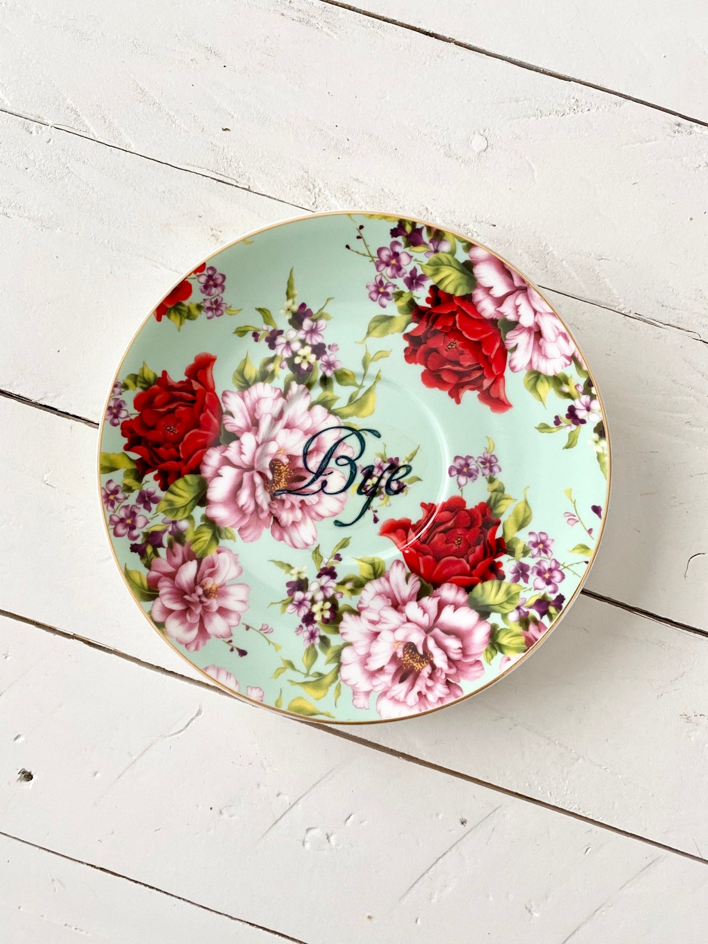 You've been Poisoned Tea Cup & Bye Saucer, Green and Red Rose Floral Pattern