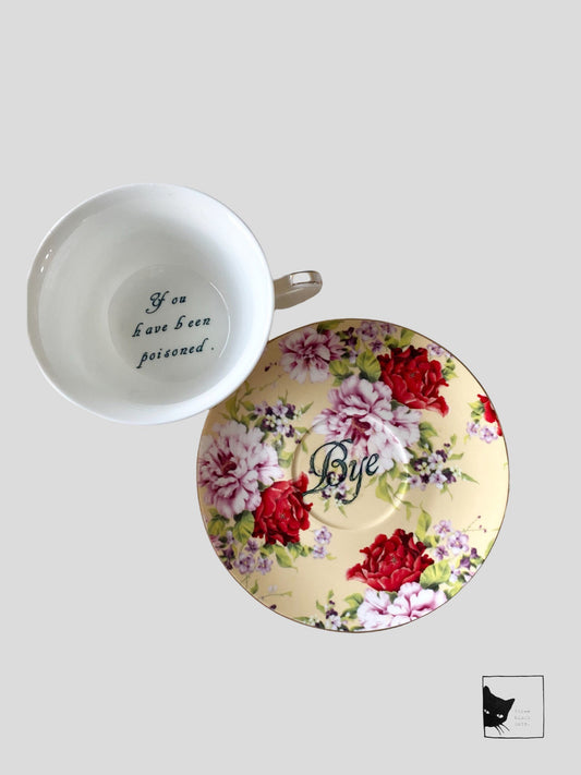 You've been Poisoned Tea Cup & Bye Saucer, Yellow and Red Rose Floral Pattern