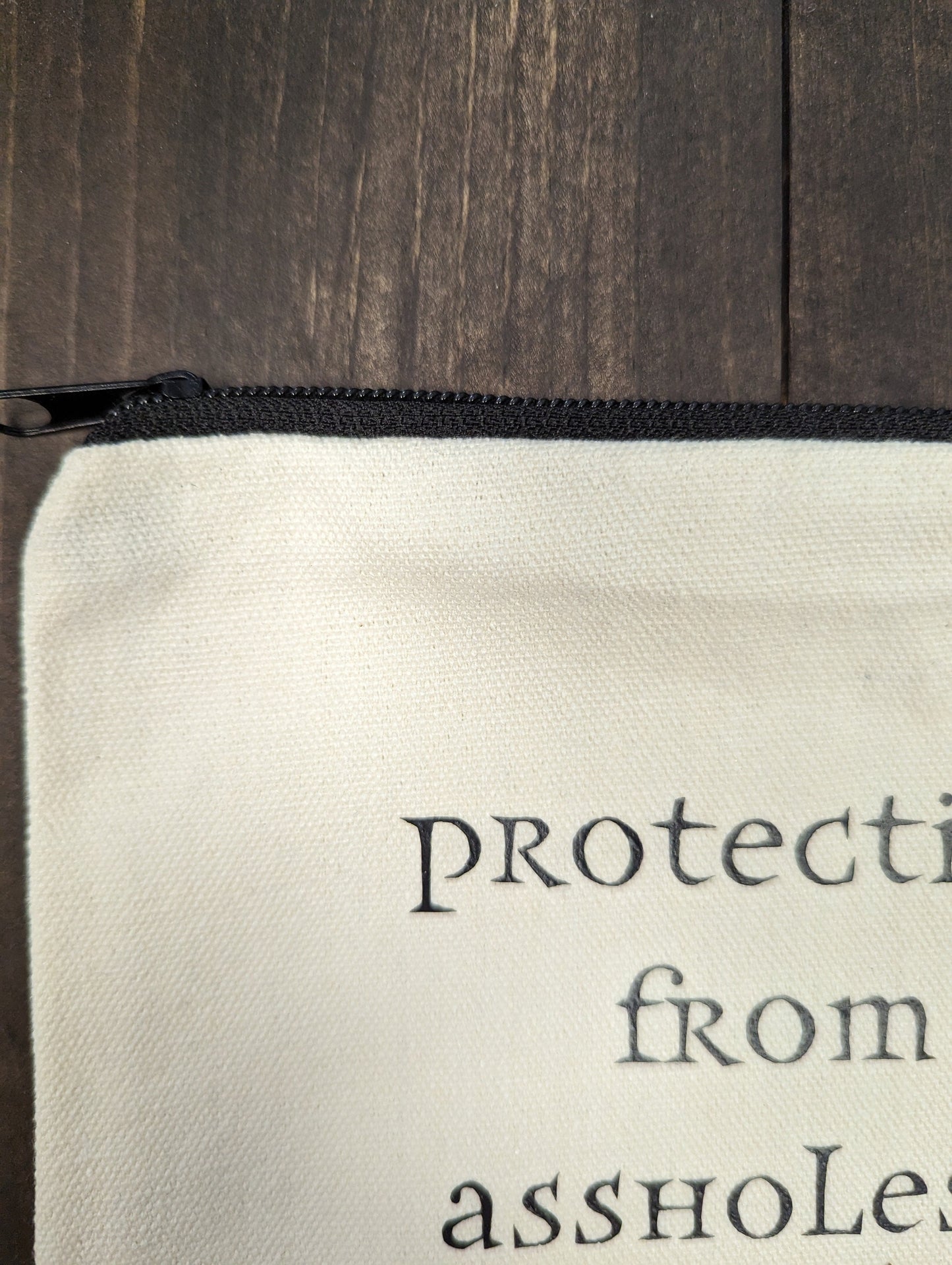 Protection from assholes, Zipper Pouch